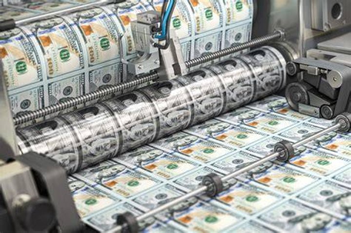 How does the government decide to print more money?